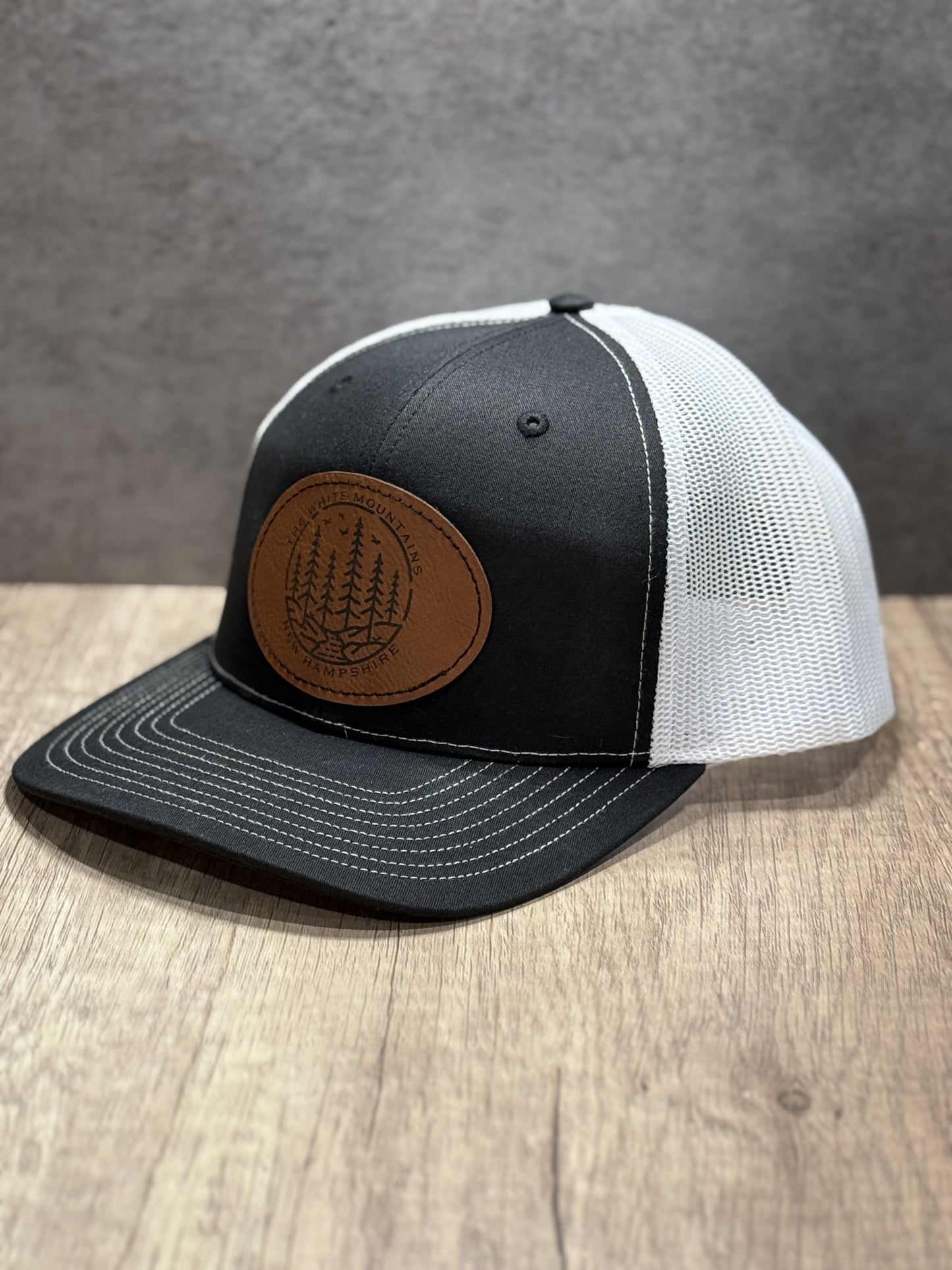 The White Mountains of New Hampshire Engraved Patch Trucker Hat
