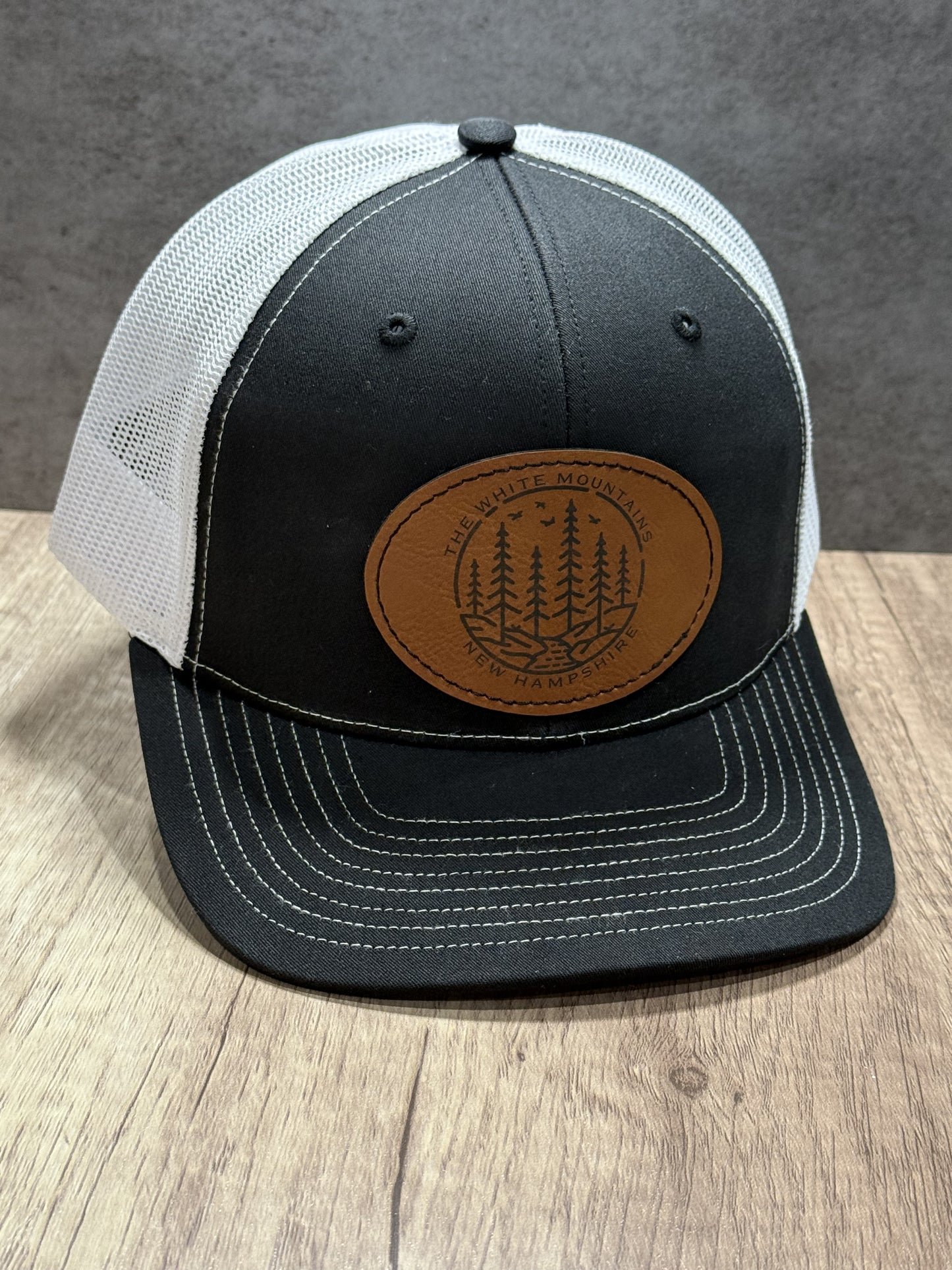 The White Mountains of New Hampshire Engraved Patch Trucker Hat