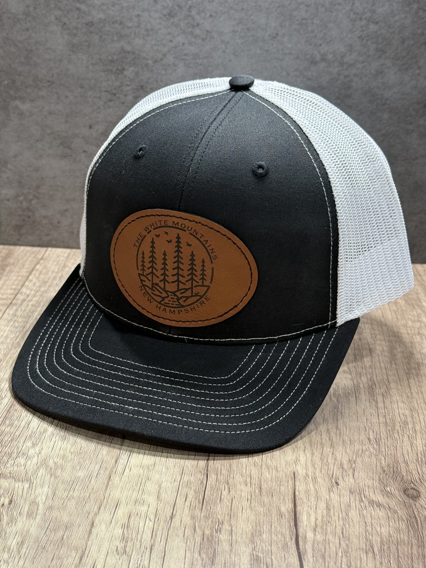 The White Mountains of New Hampshire Engraved Patch Trucker Hat